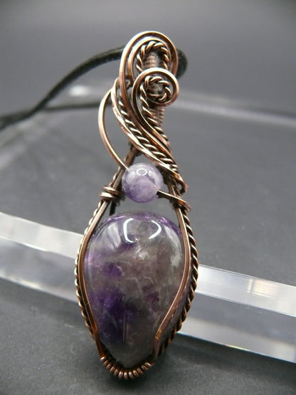 Wire wrapped amethyst gemstone pendant