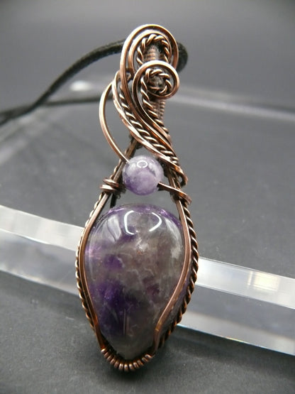 Wire wrapped amethyst gemstone pendant