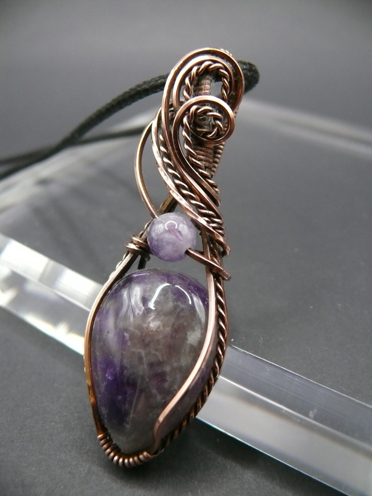 Wire wrapped amethyst gemstone pendant