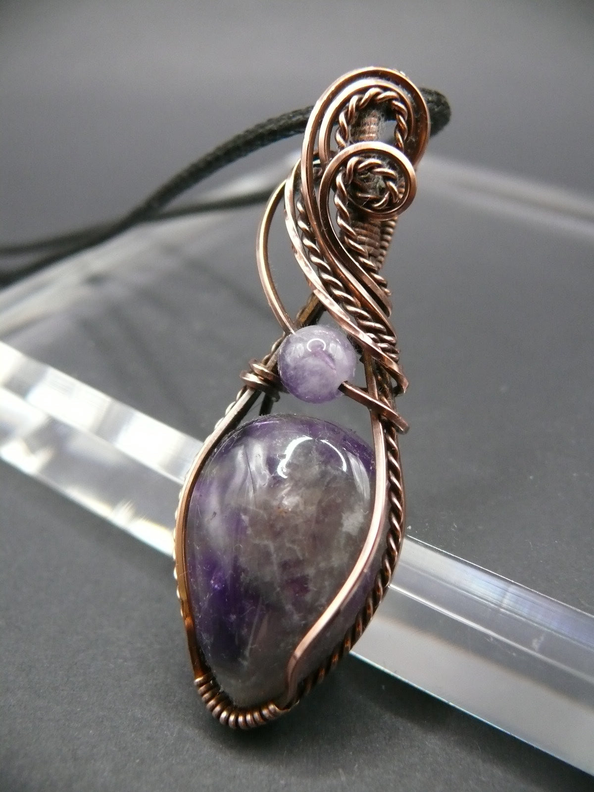 Wire wrapped amethyst gemstone pendant