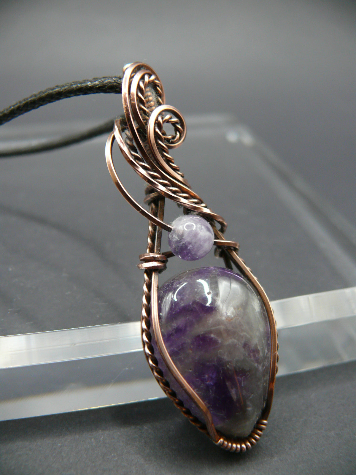 Wire wrapped amethyst gemstone pendant