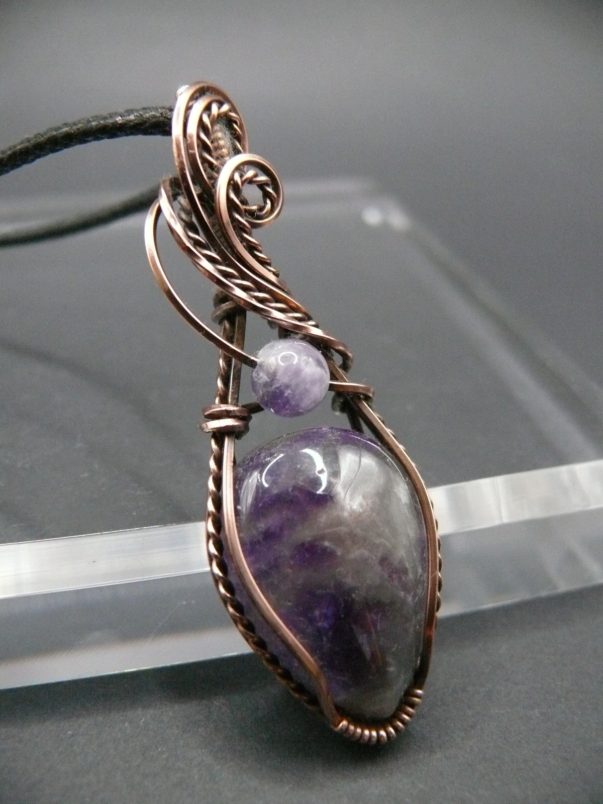 Wire wrapped amethyst gemstone pendant