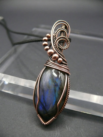 Elegant labradorite gemstone pendant in antiqued copper