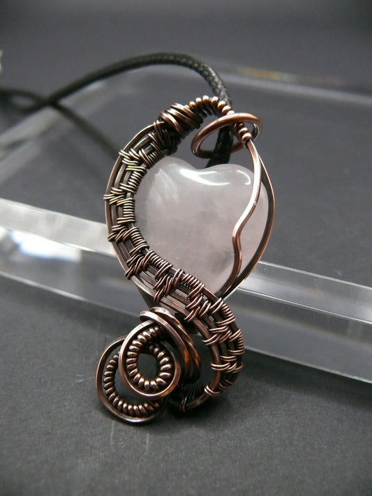 Copper wire-wrapped heart shaped pink rose quartz pendant