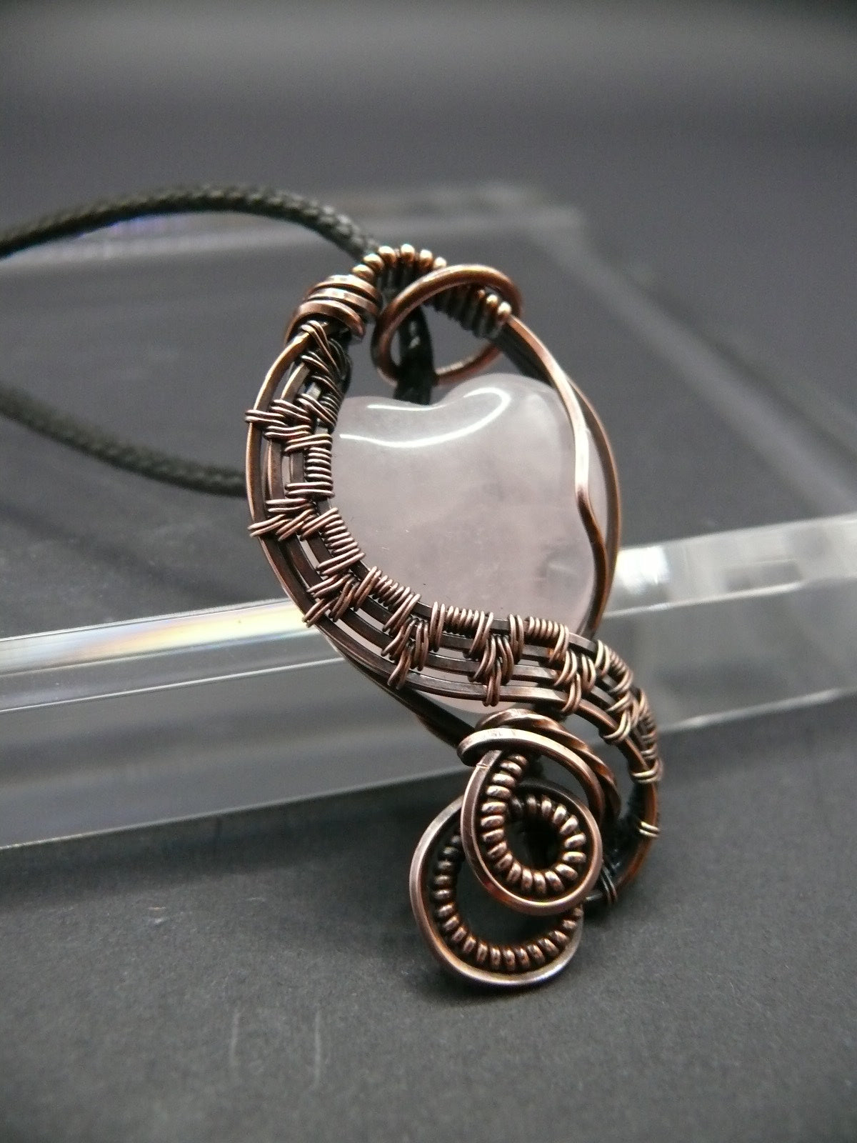 Copper wire-wrapped heart shaped pink rose quartz pendant