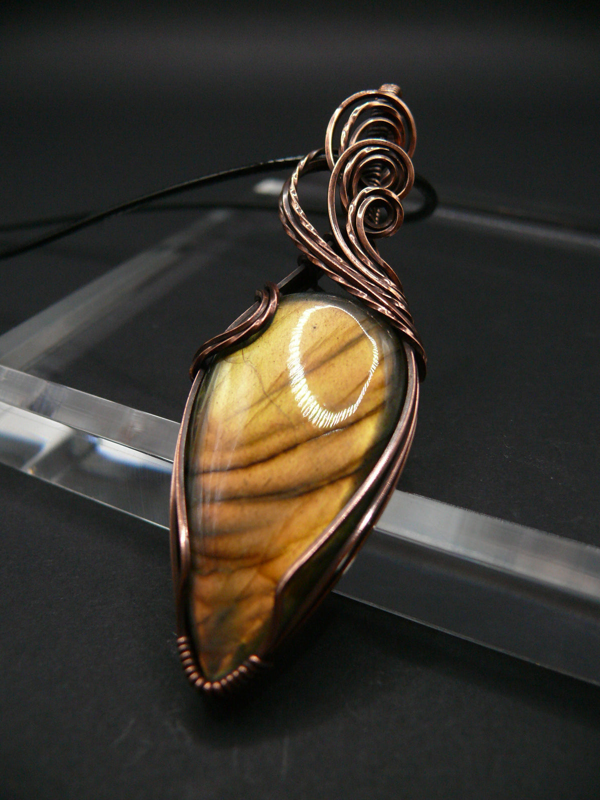 Yellow teardrop labradorite gemstone talisman.