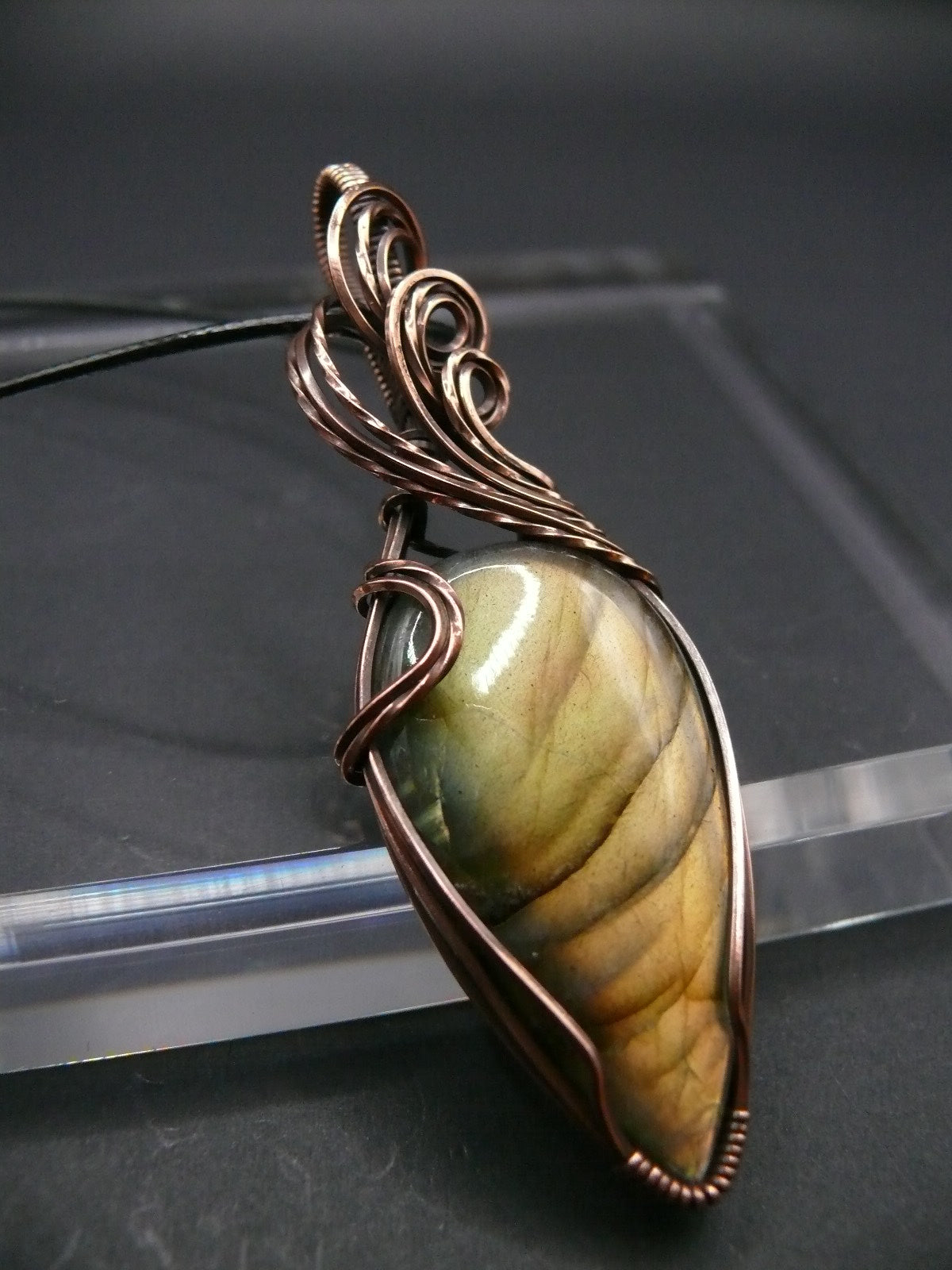 Yellow teardrop labradorite gemstone talisman.