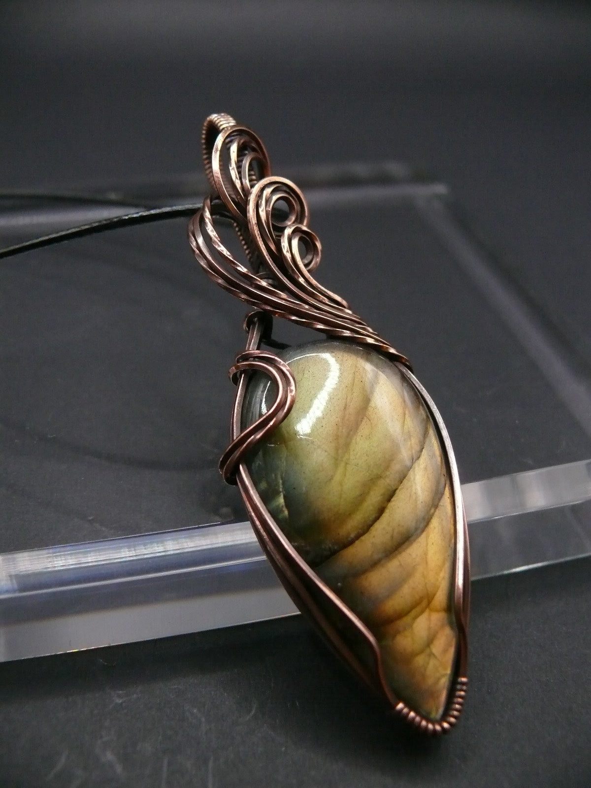 Yellow teardrop labradorite gemstone talisman.