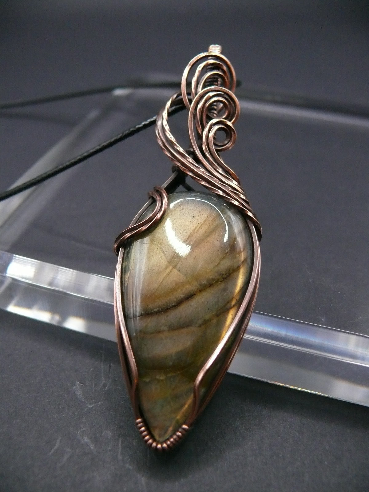 Yellow teardrop labradorite gemstone talisman.