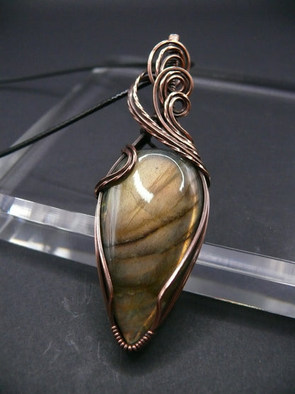 Yellow teardrop labradorite gemstone talisman.