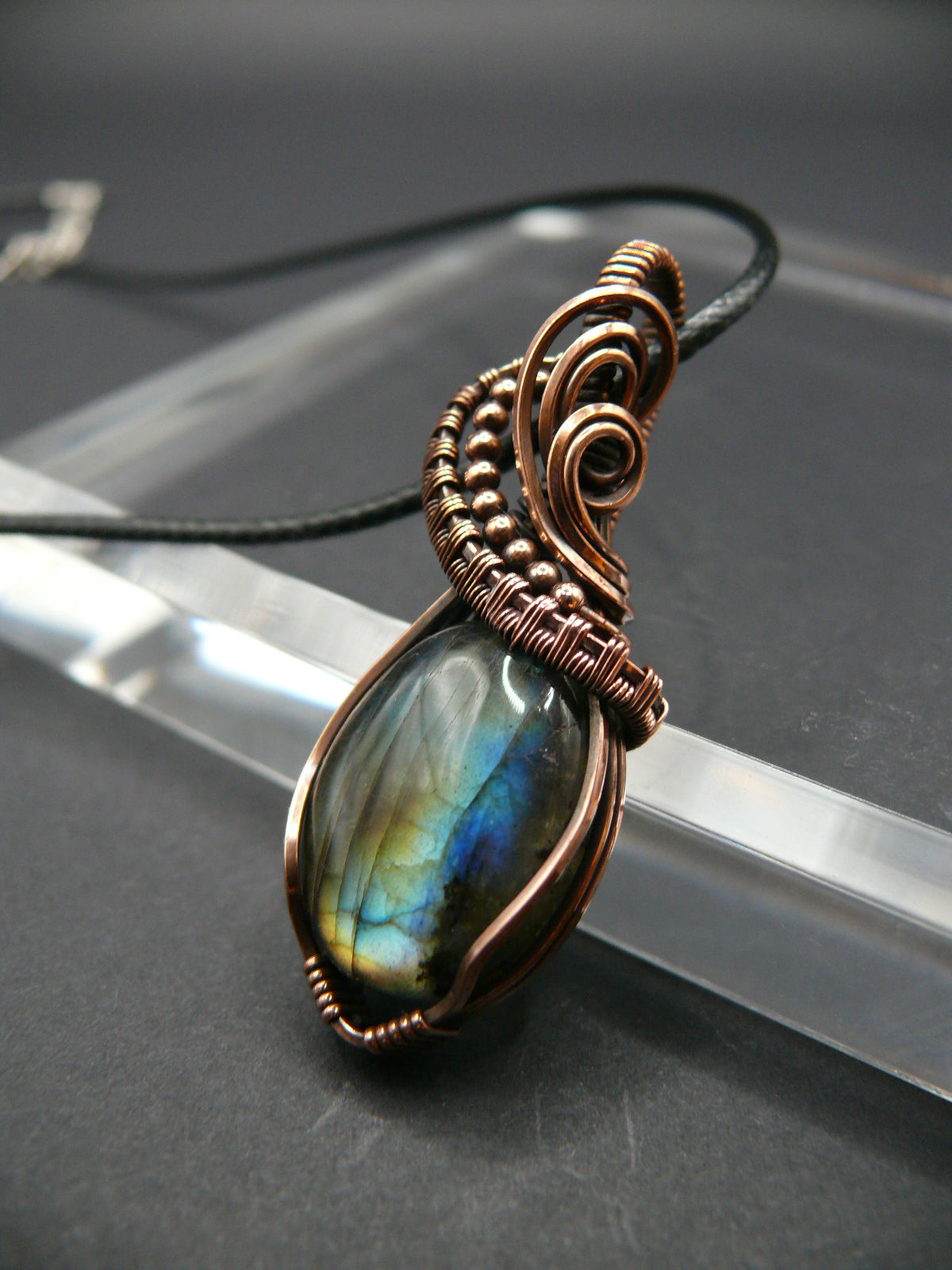 Mini labradorite pendant wrapped in antiqued copper