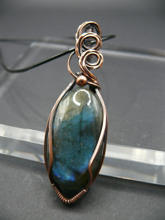 Artisan labradorite crystal in rustic copper