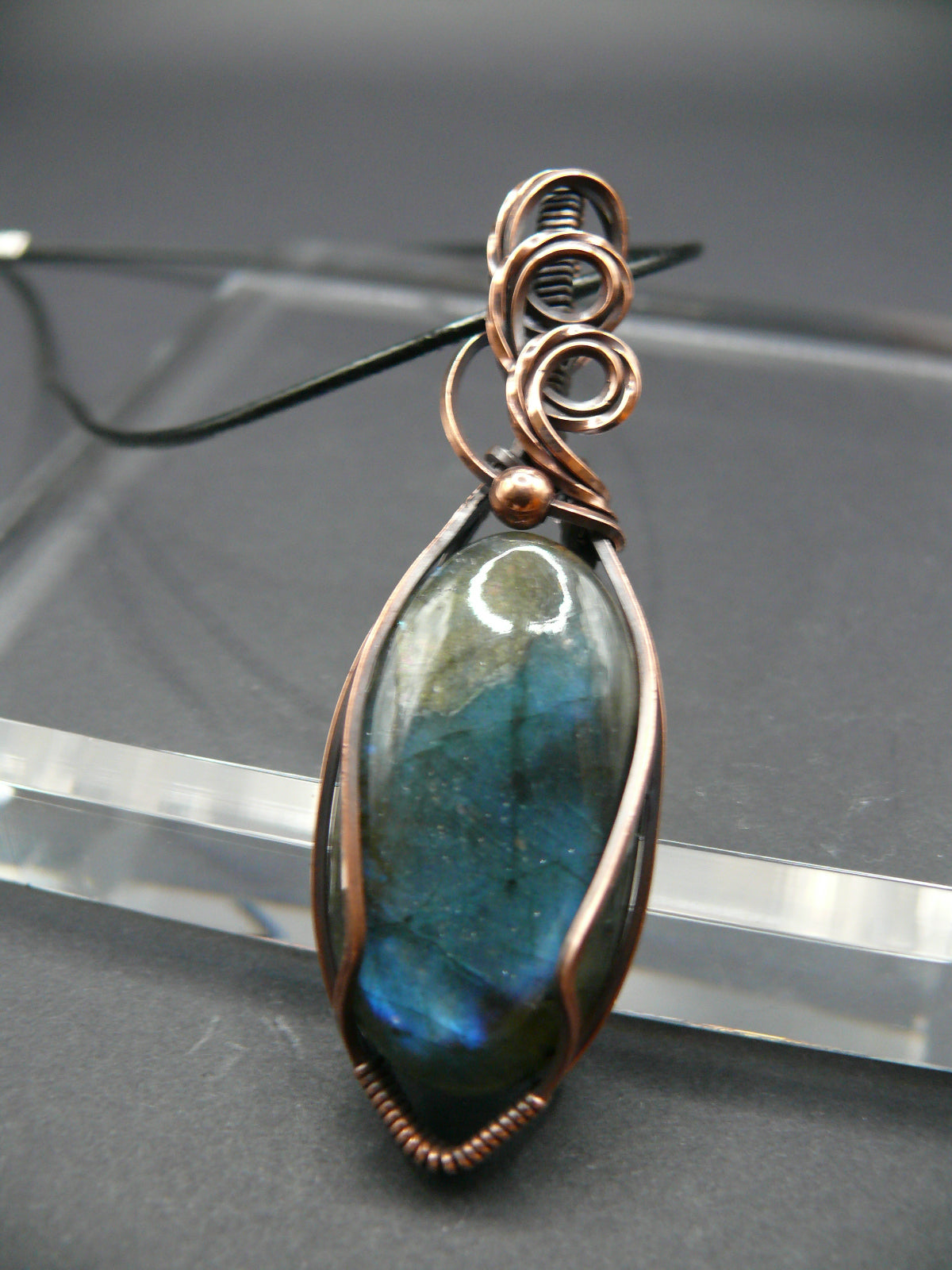 Artisan labradorite crystal in rustic copper