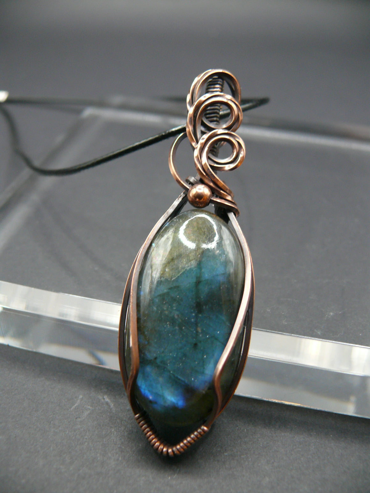 Artisan labradorite crystal in rustic copper