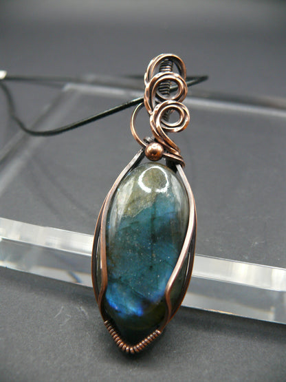 Artisan labradorite crystal in rustic copper