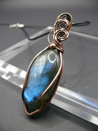 Artisan labradorite crystal in rustic copper