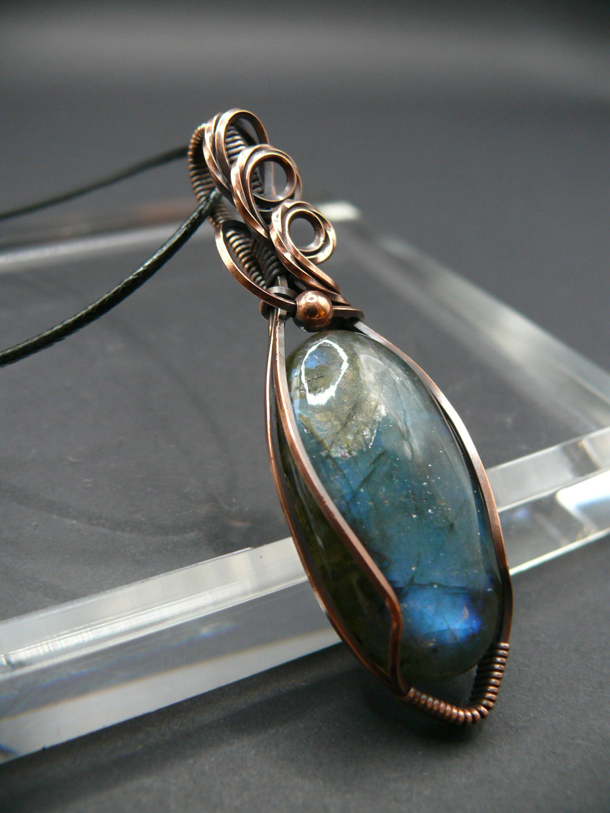 Artisan labradorite crystal in rustic copper