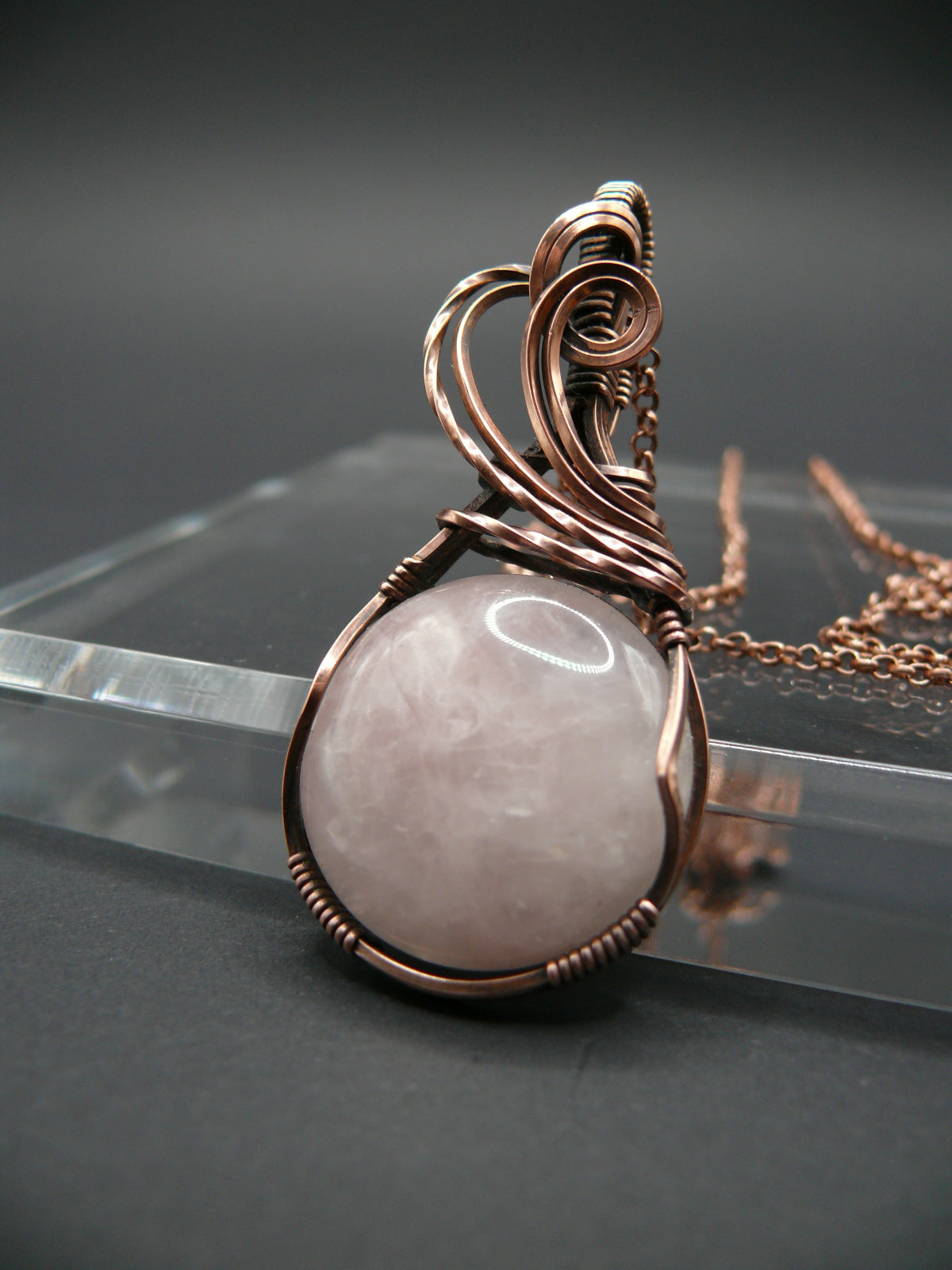 Copper wire wrapped pink rose quartz pendant