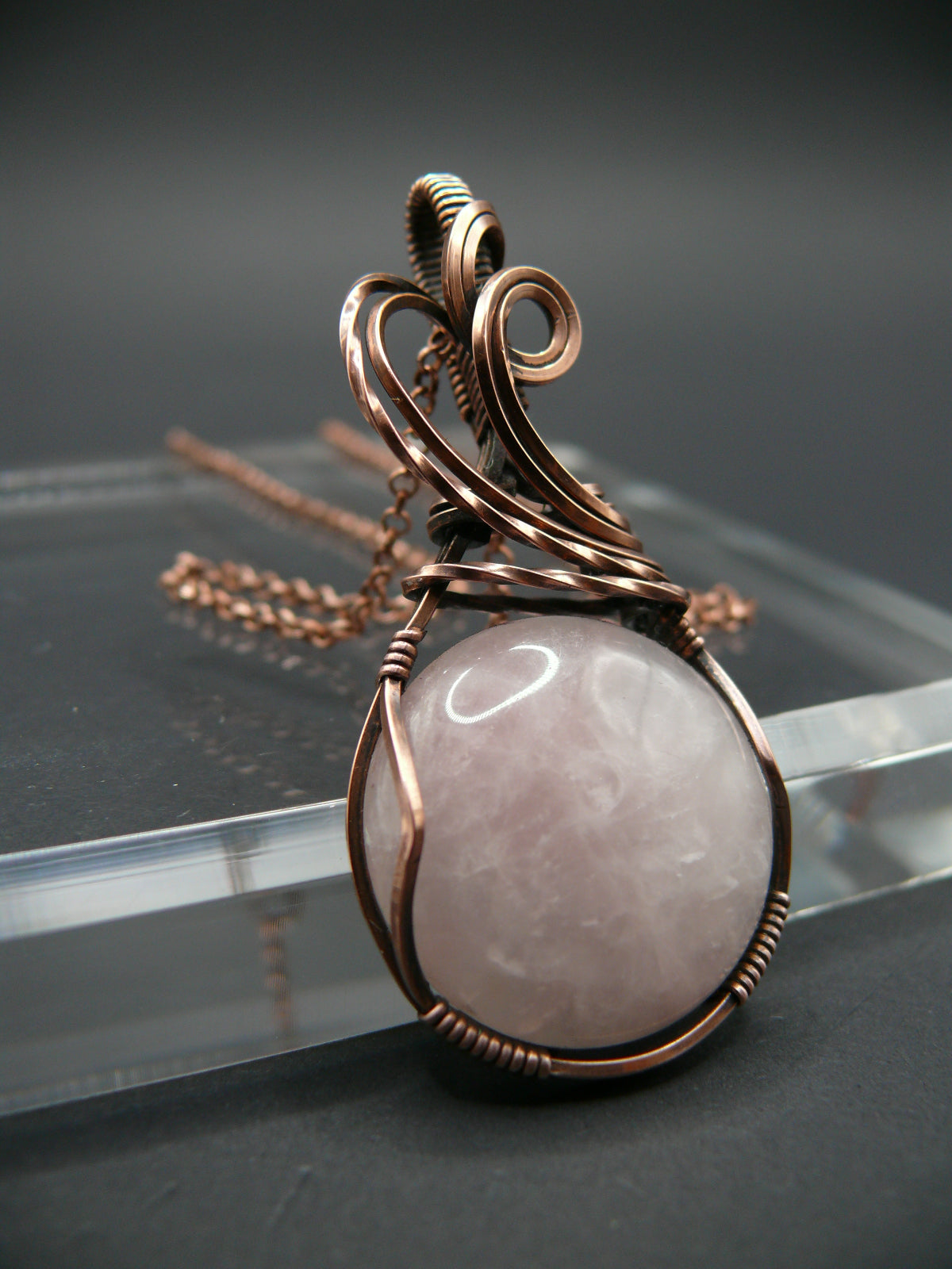 Copper wire wrapped pink rose quartz pendant