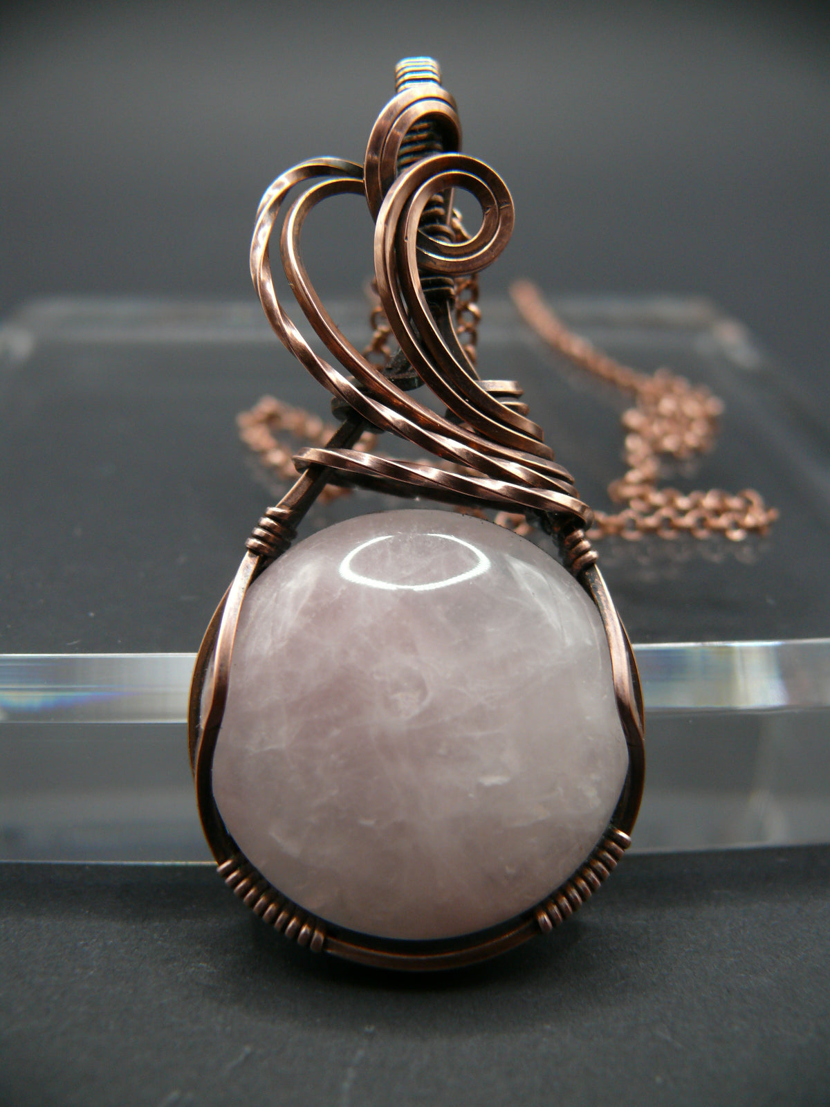 Copper wire wrapped pink rose quartz pendant