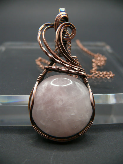 Copper wire wrapped pink rose quartz pendant