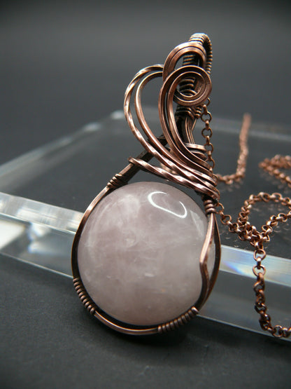 Copper wire wrapped pink rose quartz pendant