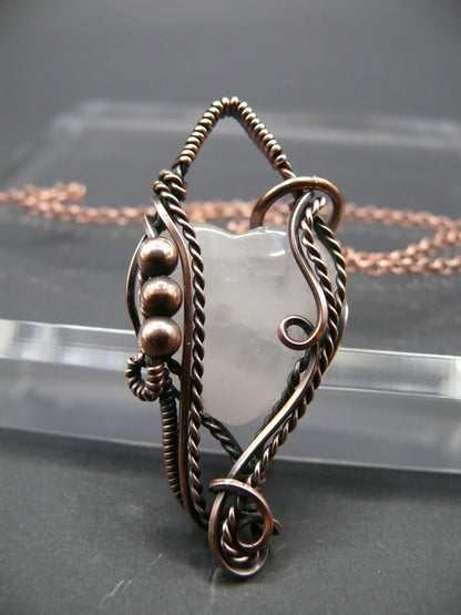 Copper wire-wrapped heart shaped pink rose quartz pendant