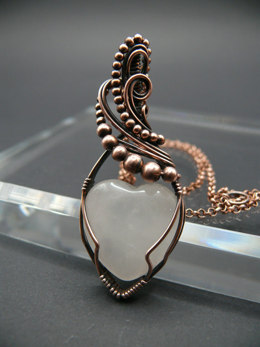 Copper wire-wrapped heart shaped pink rose quartz pendant