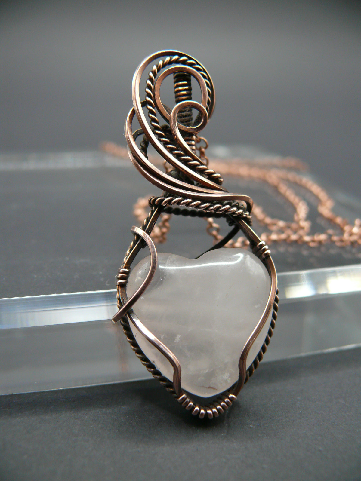 Copper wire-wrapped heart shaped pink rose quartz pendant