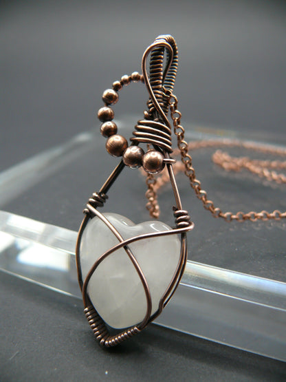 Copper wire-wrapped heart shaped pink rose quartz pendant