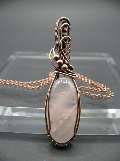 Handmade copper wire wrapped rose quartz pendant