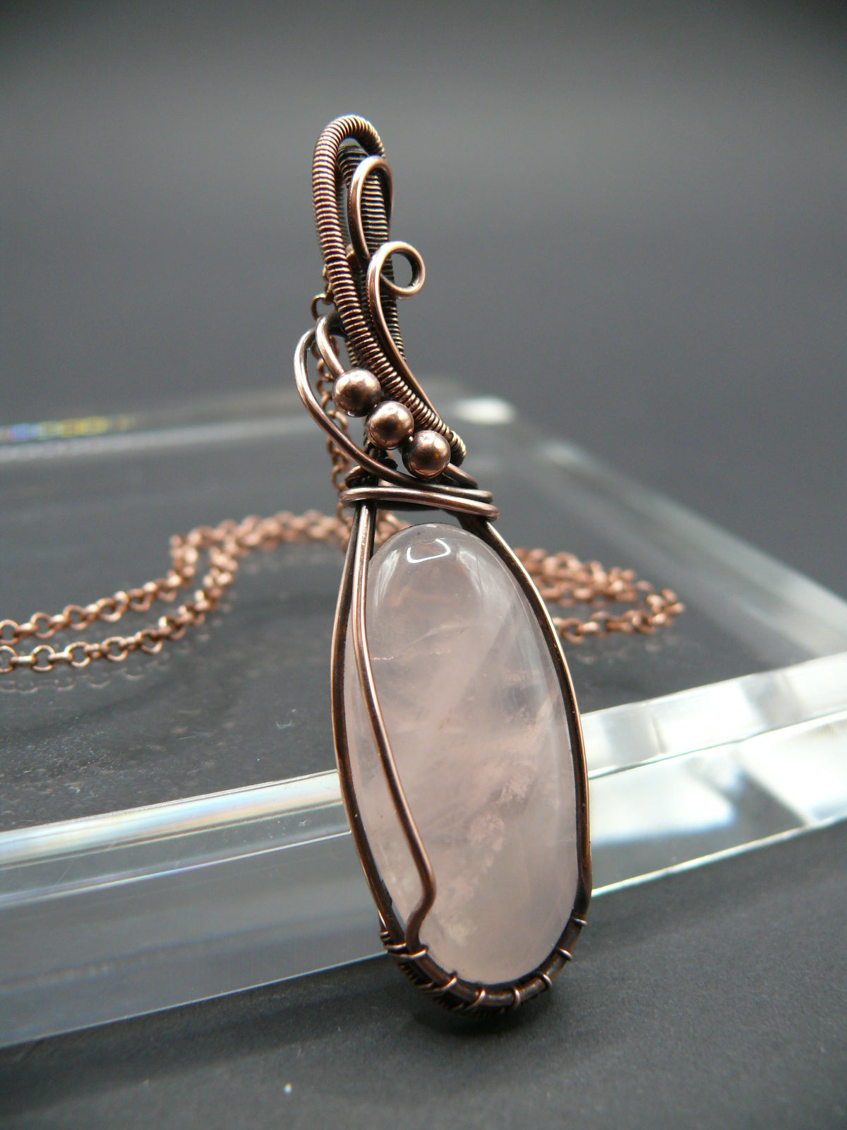 Handmade copper wire wrapped rose quartz pendant