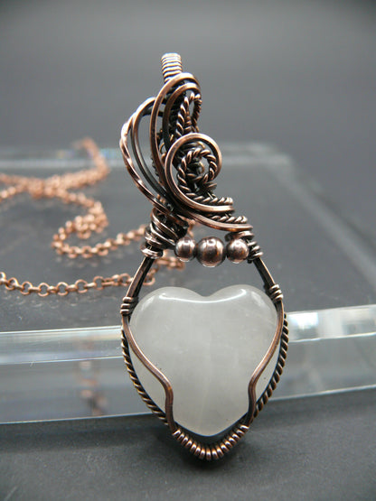 Heart shaped pink rose quartz gemstone pendant