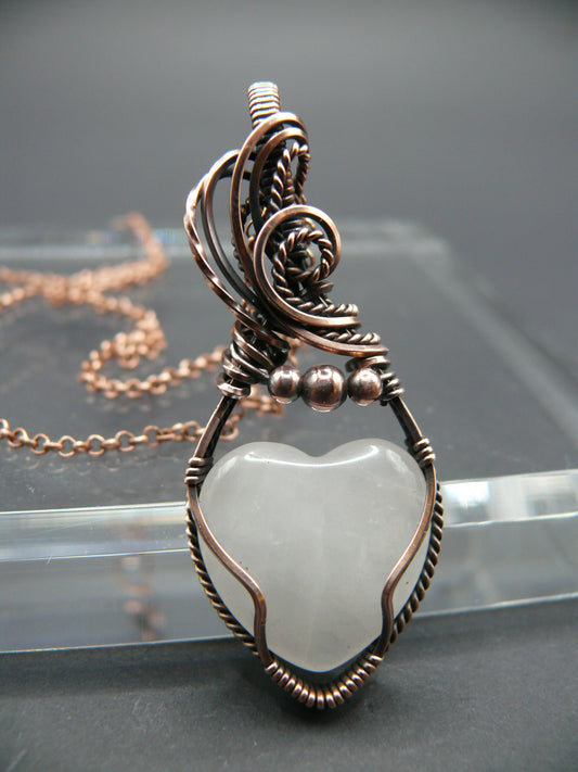 Heart shaped pink rose quartz gemstone pendant