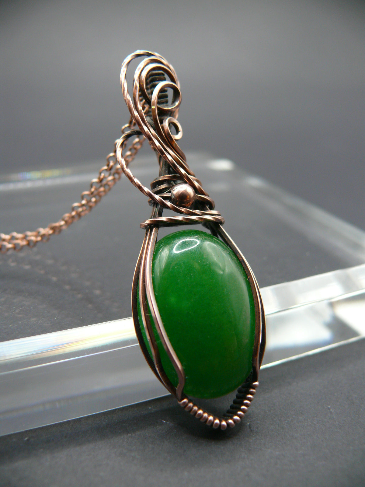 Handmade green jade necklace in copper