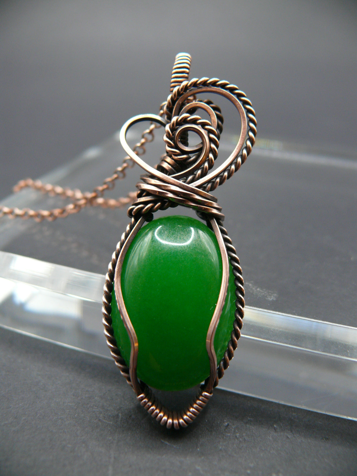 Green jade wire wrapped pendant