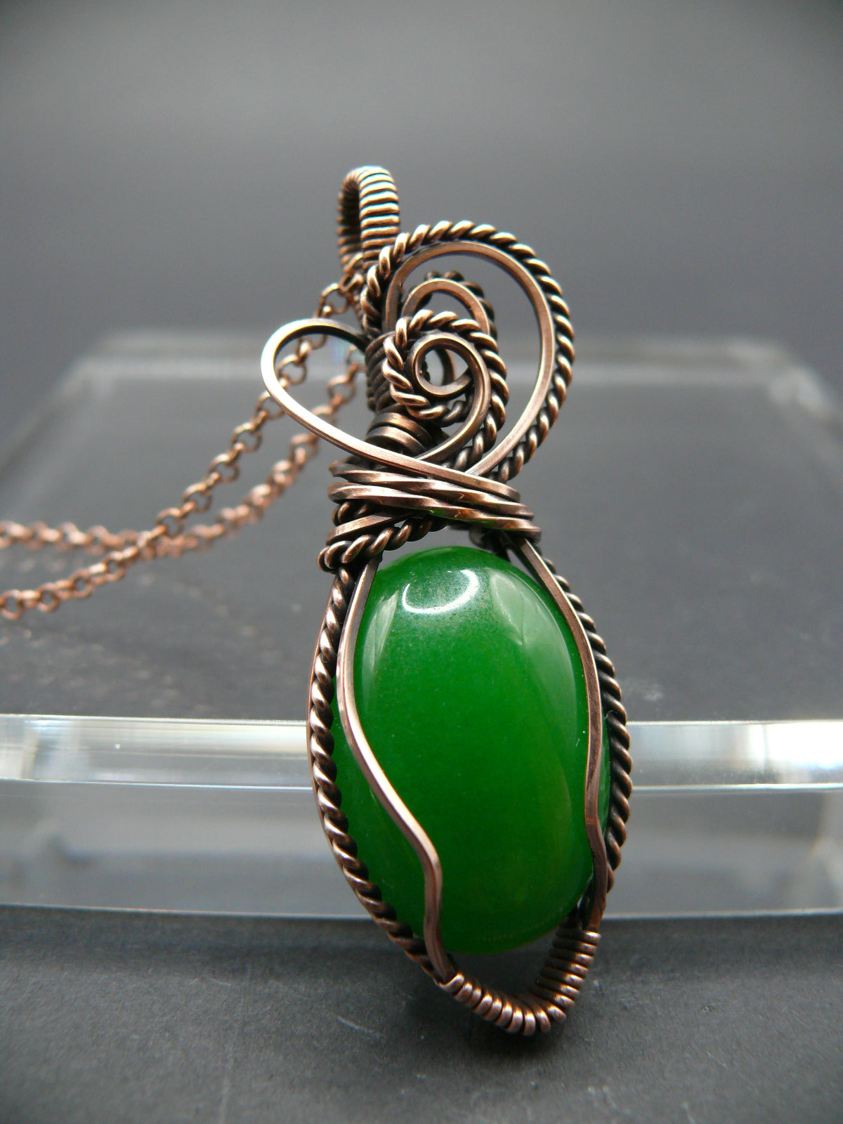 Green jade wire wrapped pendant