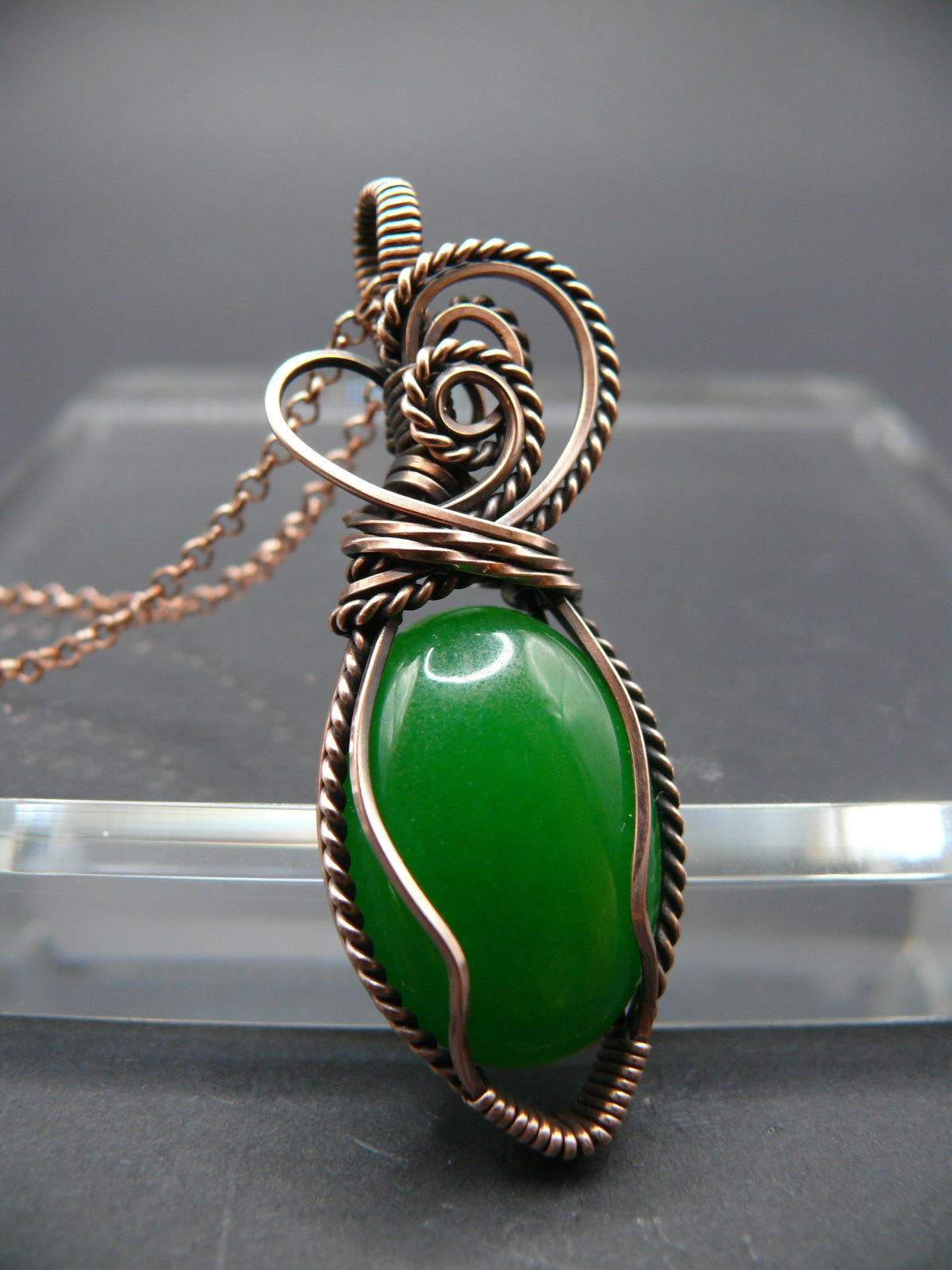 Green jade wire wrapped pendant