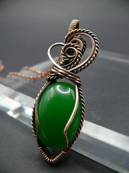 Green jade wire wrapped pendant