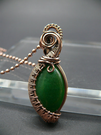 Copper wire weaved green jade pendant