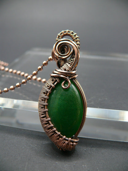 Copper wire weaved green jade pendant