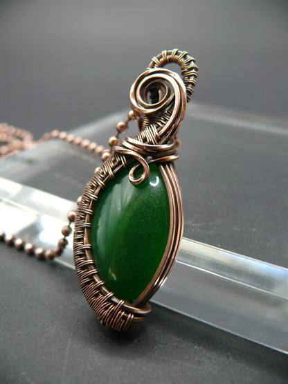 Copper wire weaved green jade pendant