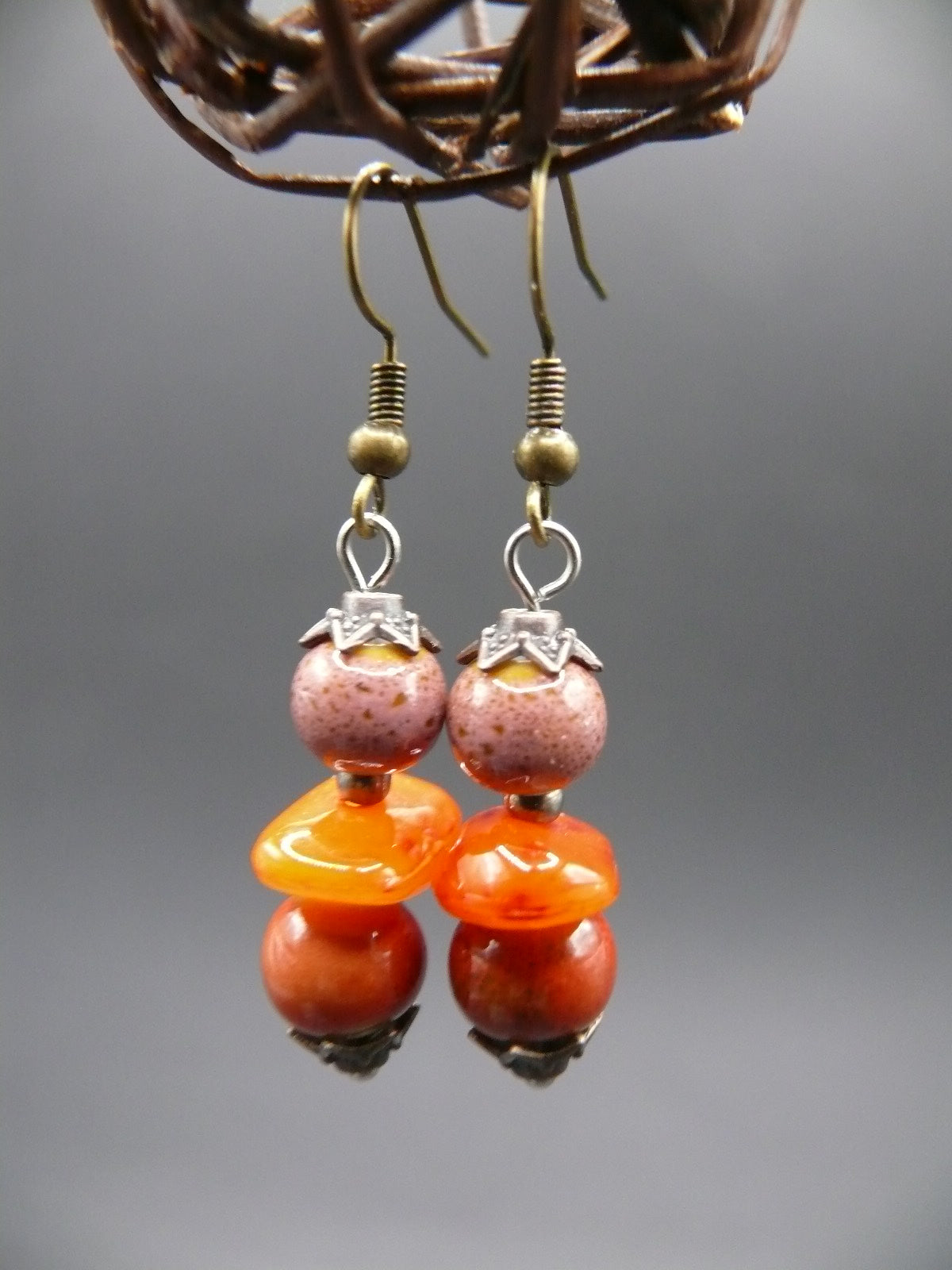 Amber and ceramic bead dangle earrings