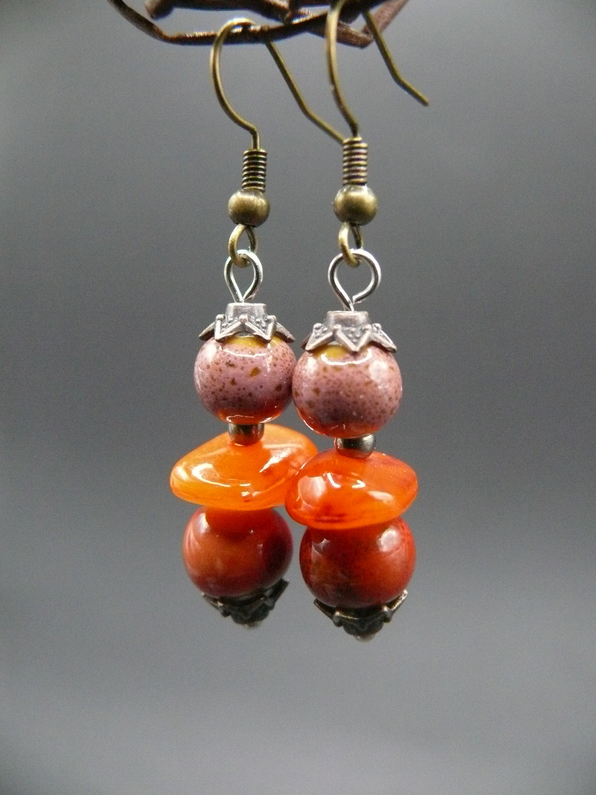 Amber and ceramic bead dangle earrings