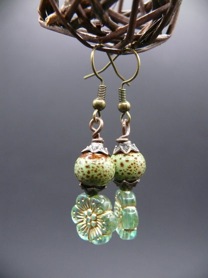 Ceramic bead and flower design dangle earrings