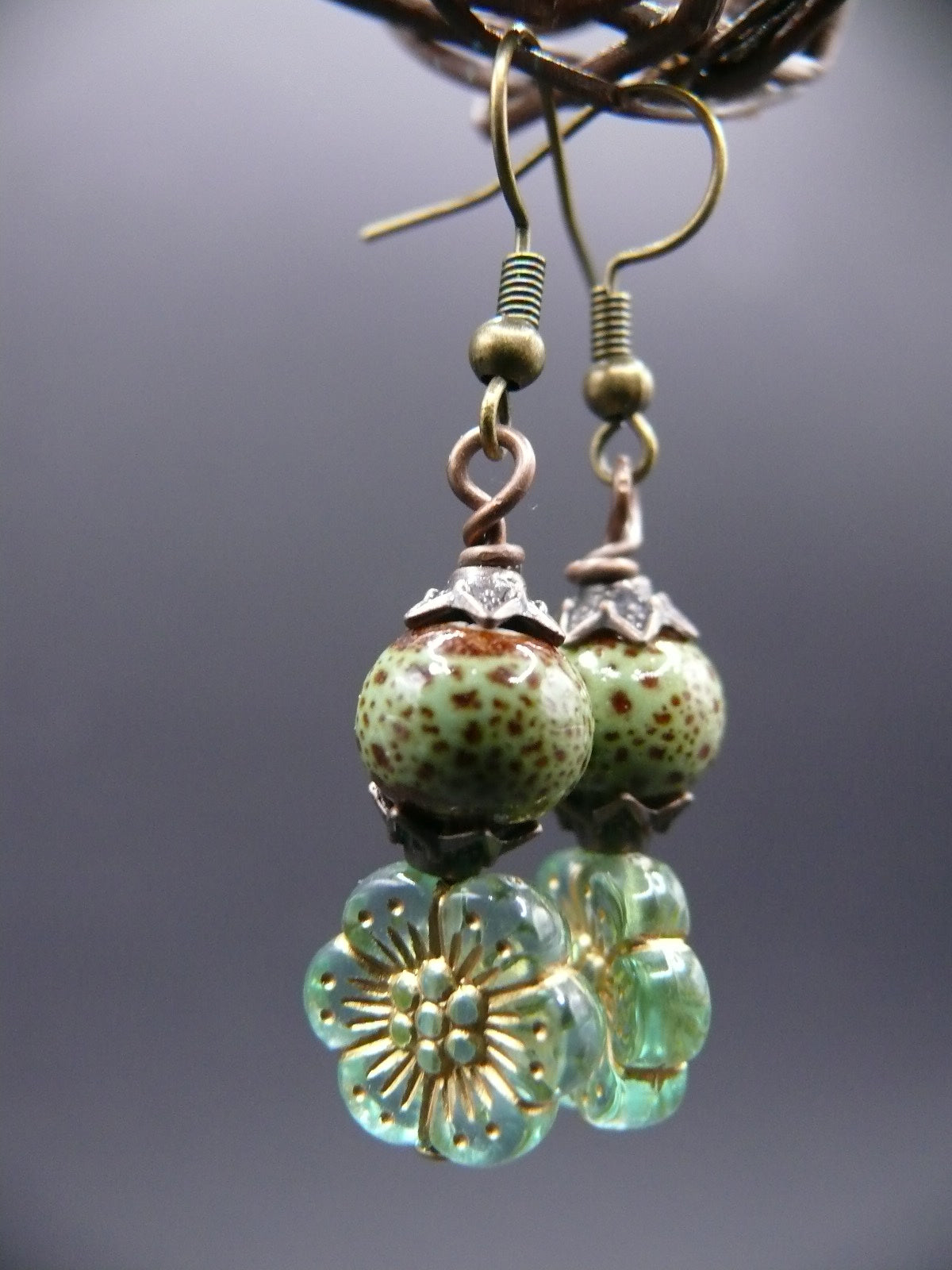 Ceramic bead and flower design dangle earrings