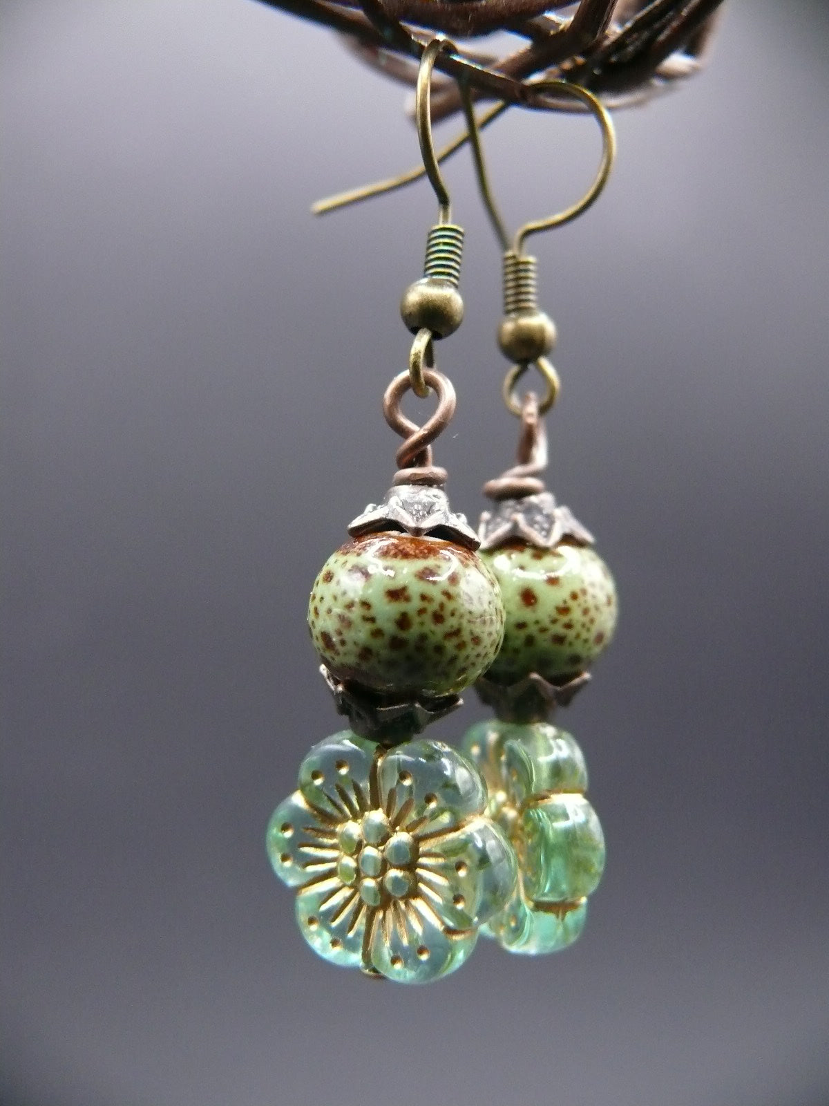 Ceramic bead and flower design dangle earrings