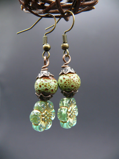 Ceramic bead and flower design dangle earrings