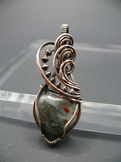 Heart shaped wire wrapped bloodstone gemstone pendant