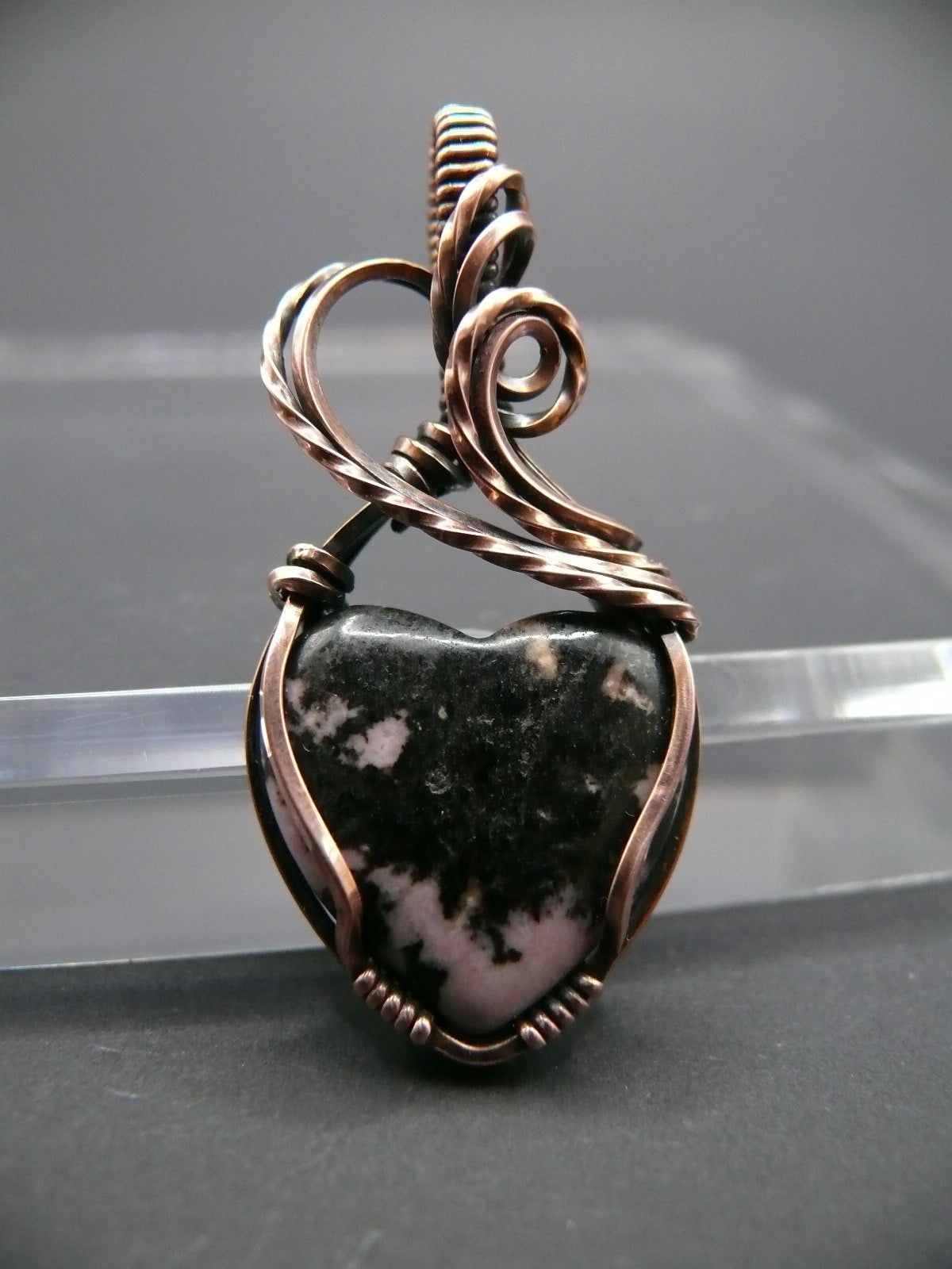 Rhodochrosite gemstone heart pendant in solid copper